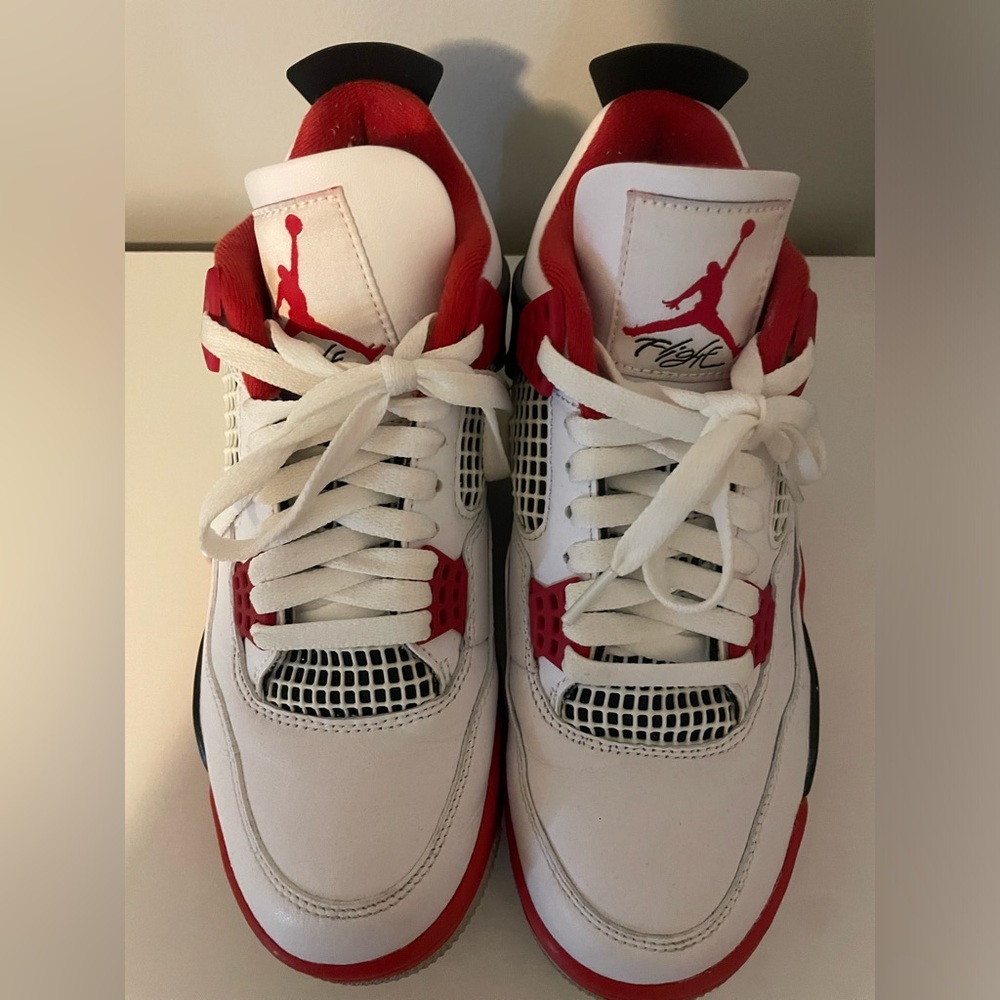 Fire red Jordan 4s
